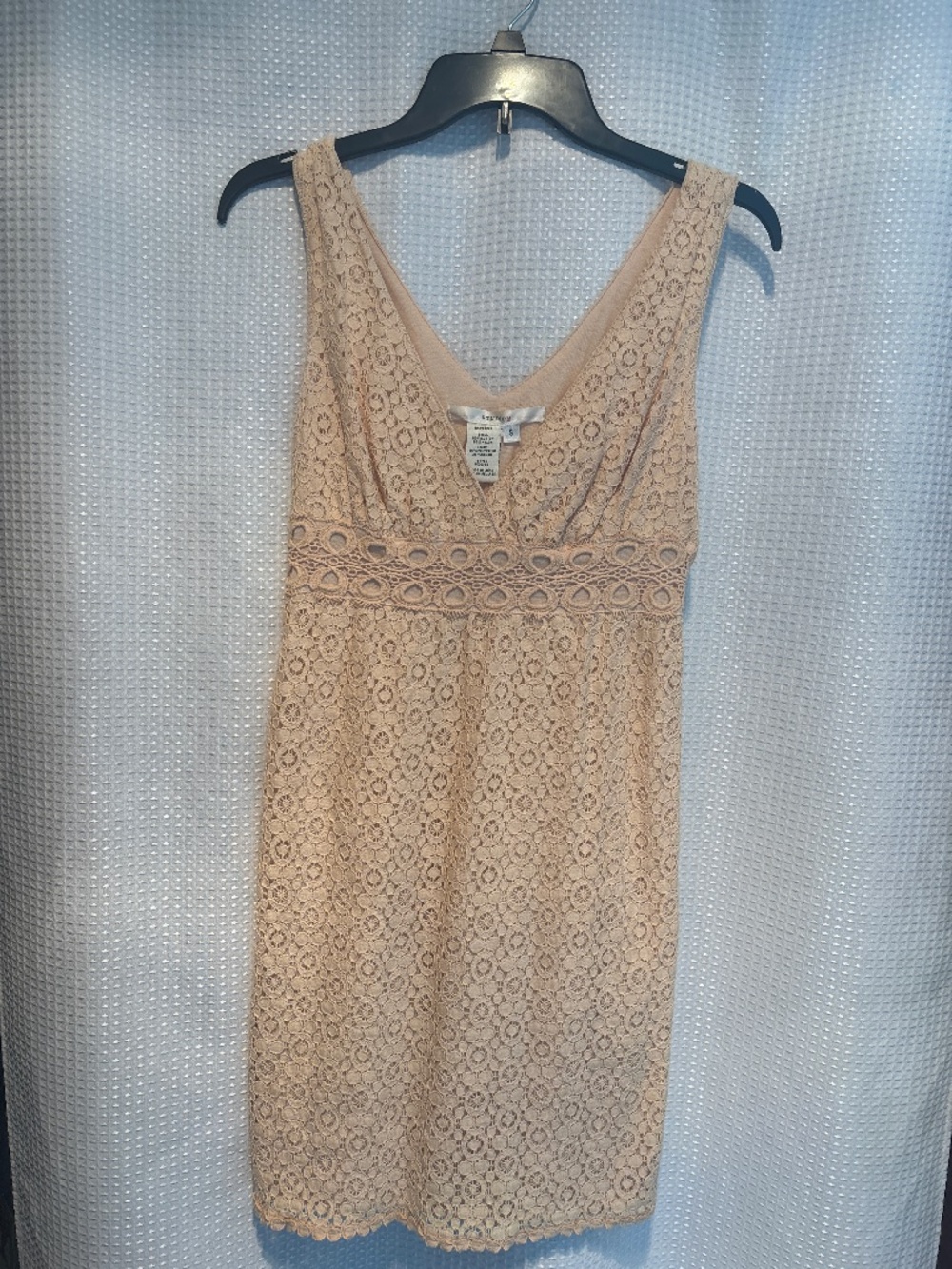 Cream colored knee length dress
